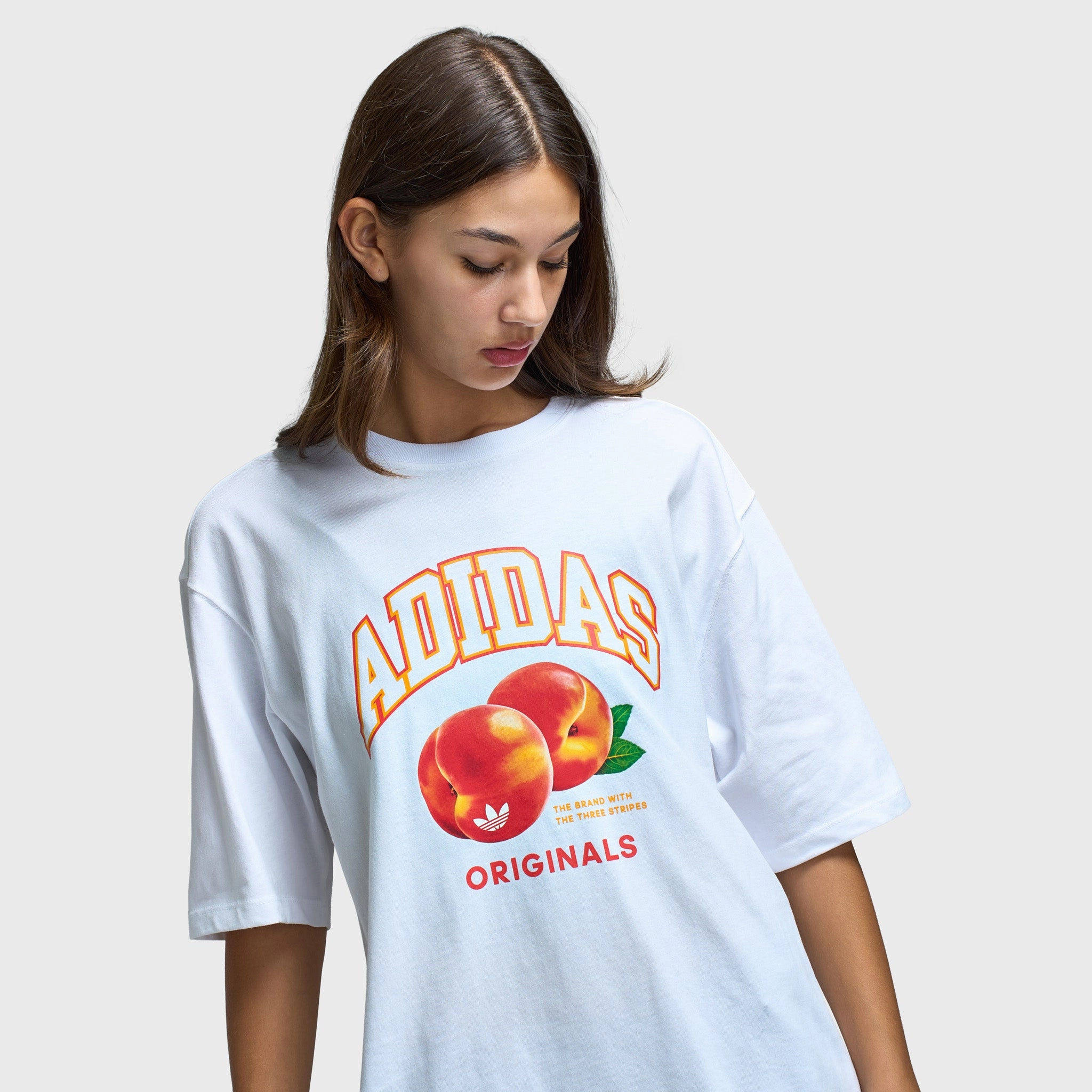 sporty wear Adidas Women's Oversized Peach Graphic Tee / White