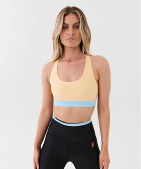 FadeResistant DoubleLayeredHem P.E Nation Denizen Sports Bra (Apricot Sherbet)