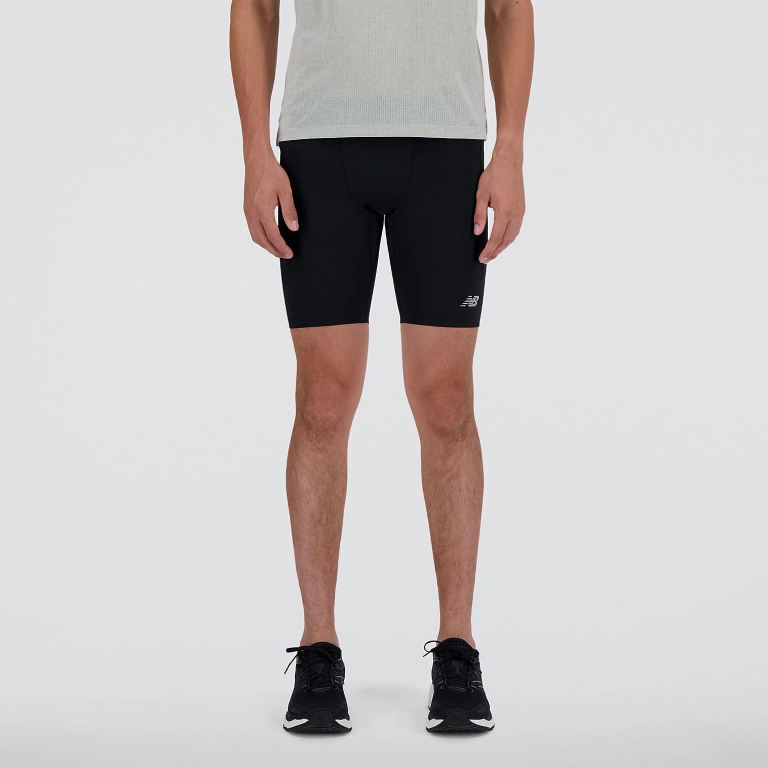 New Balance Men's Sleek Pocket Half Tight 9" Versatile Fit