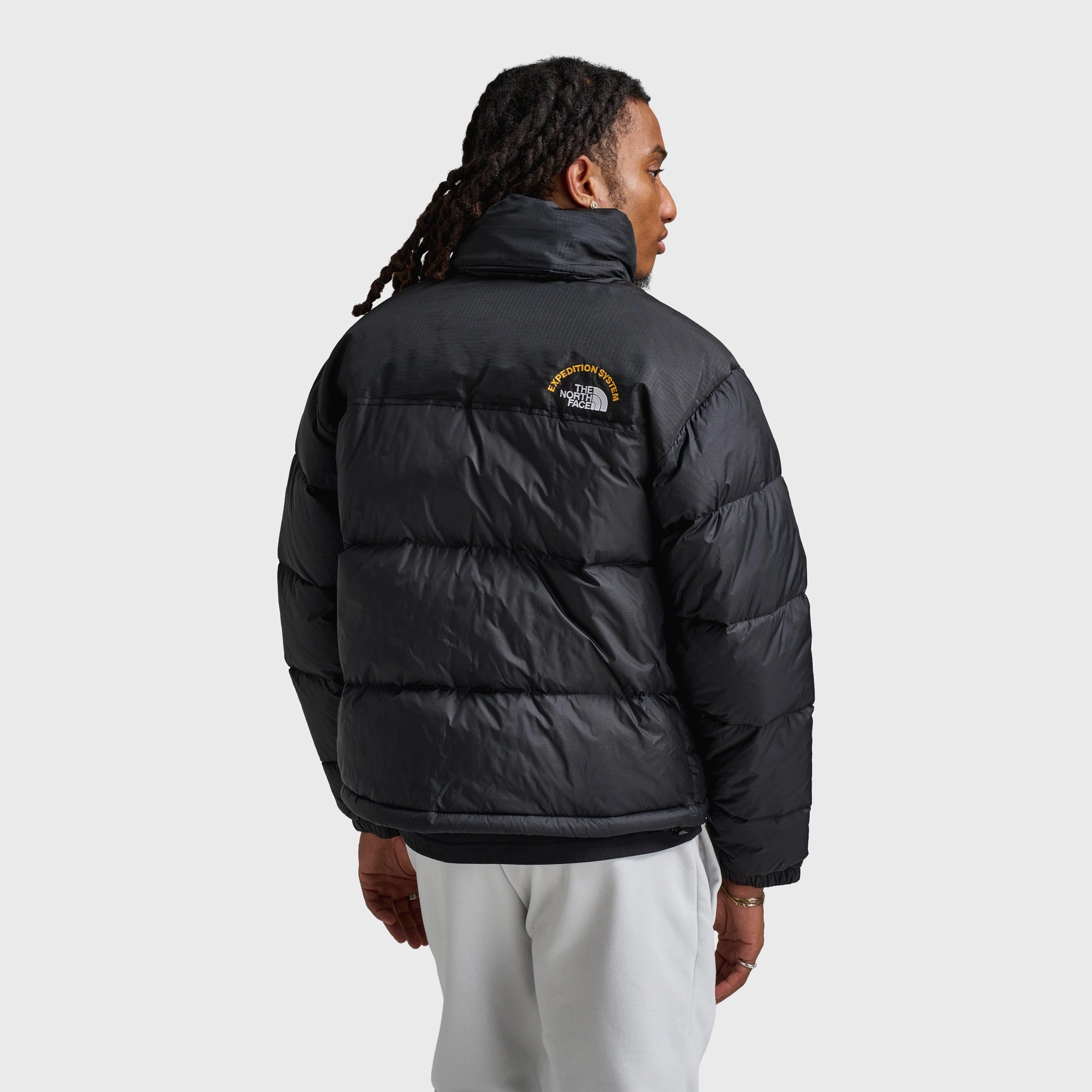 The North Face 1996 Retro Nuptse Jacket / TNF Black Pressure Dispersion Nodes