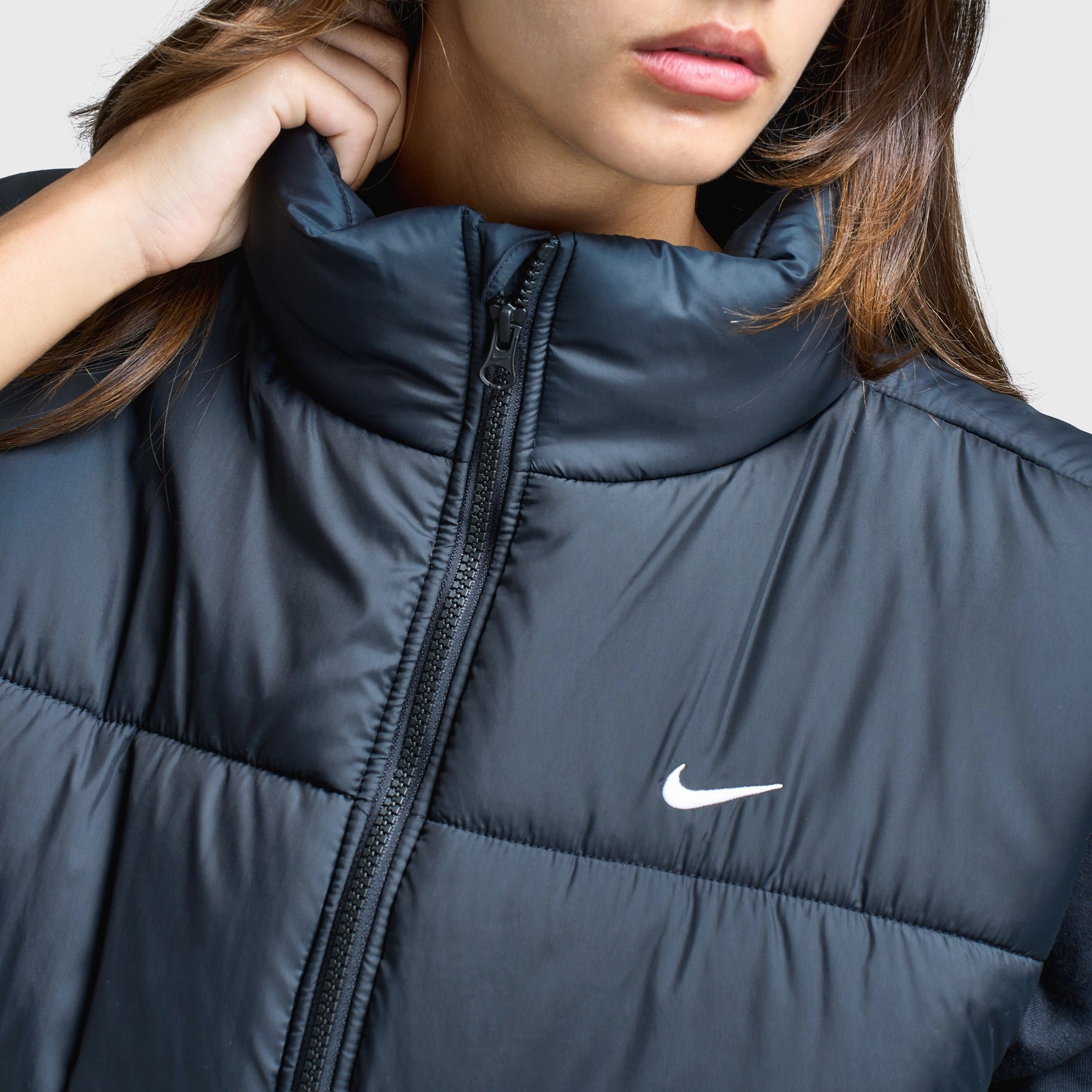 Ergonomic Articulation Matte Surface Texture Nike Women's Therma-FIT Loose Vest / Black