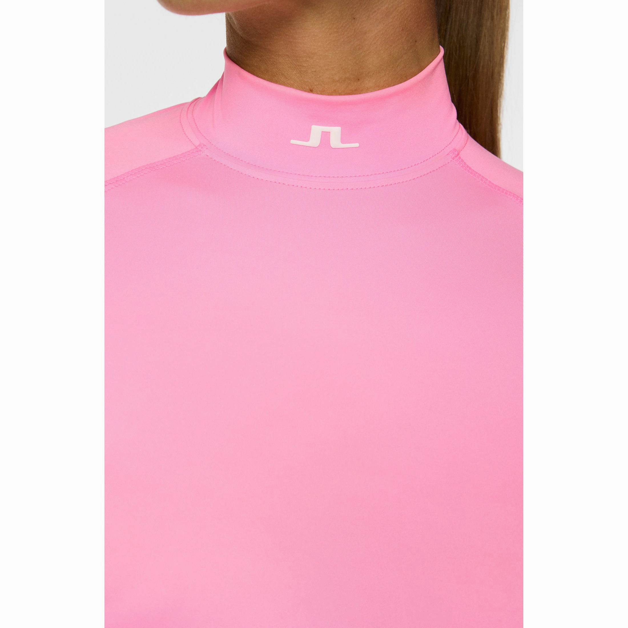 J.Lindeberg Women's Ella Compression Golf Shirt - Eosine Pink Ventilated Side Gussets Travel Friendly