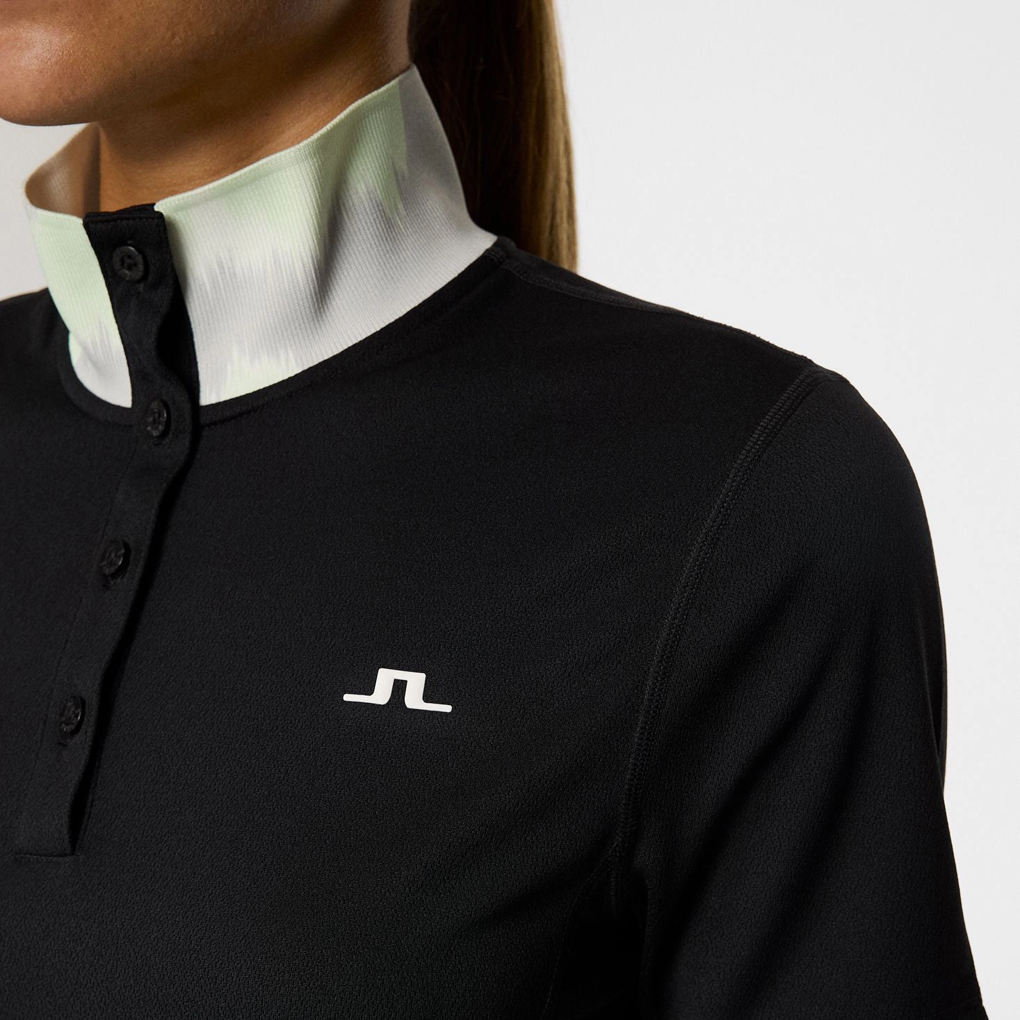J.Lindeberg Women's Piper Golf Polo Shirt - Black Weekend Style Golf Course