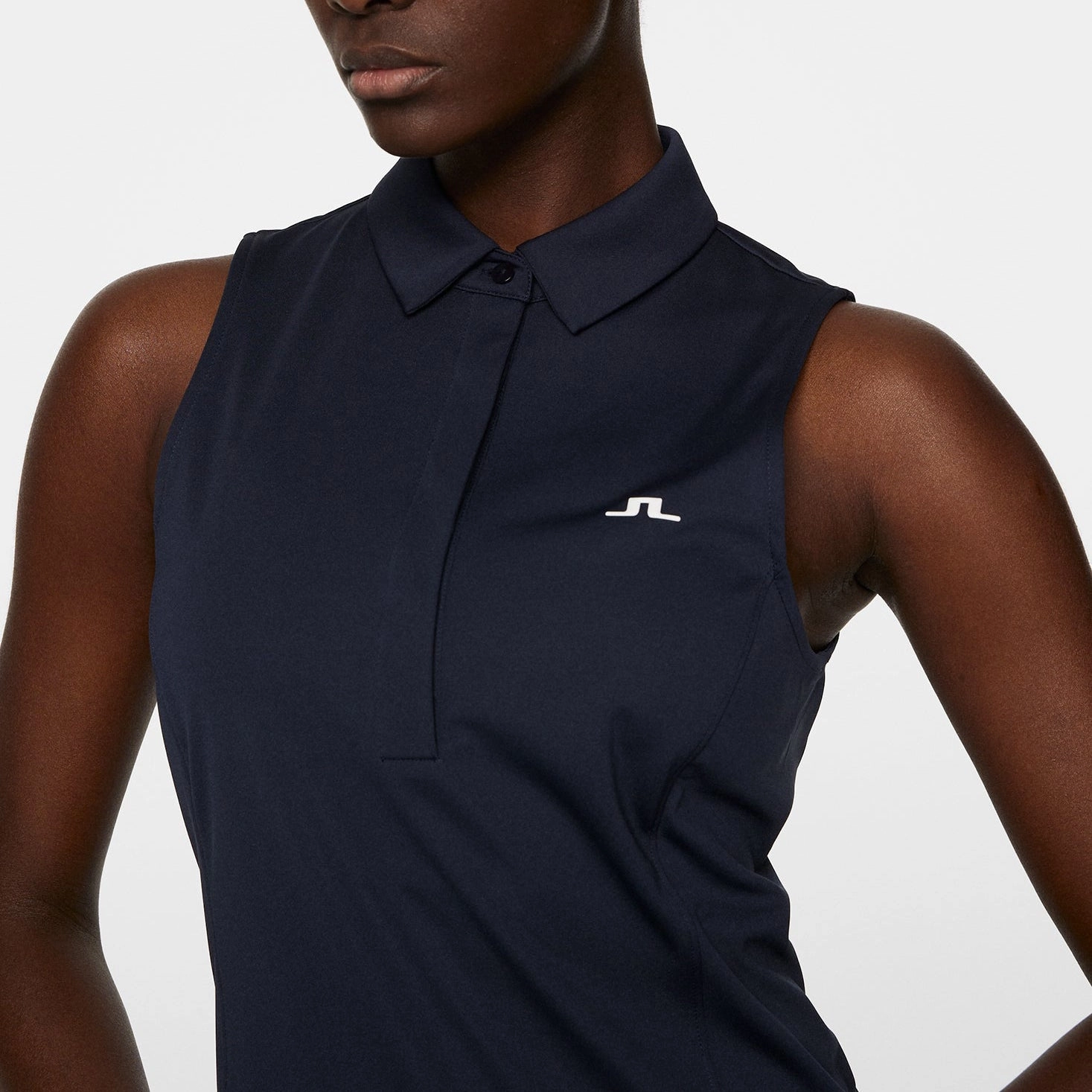 J.Lindeberg Women's Dena Sleeveless Golf Polo Shirt - JL Navy NoChafe Collar Lining Recycled Polyester Mix
