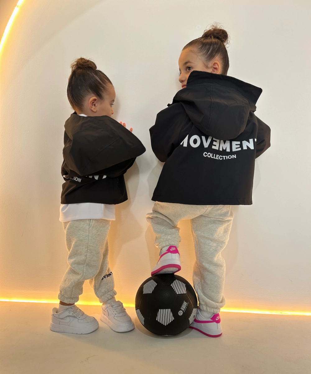 Flexible Hemline Movement Collection Windbreaker (Black)