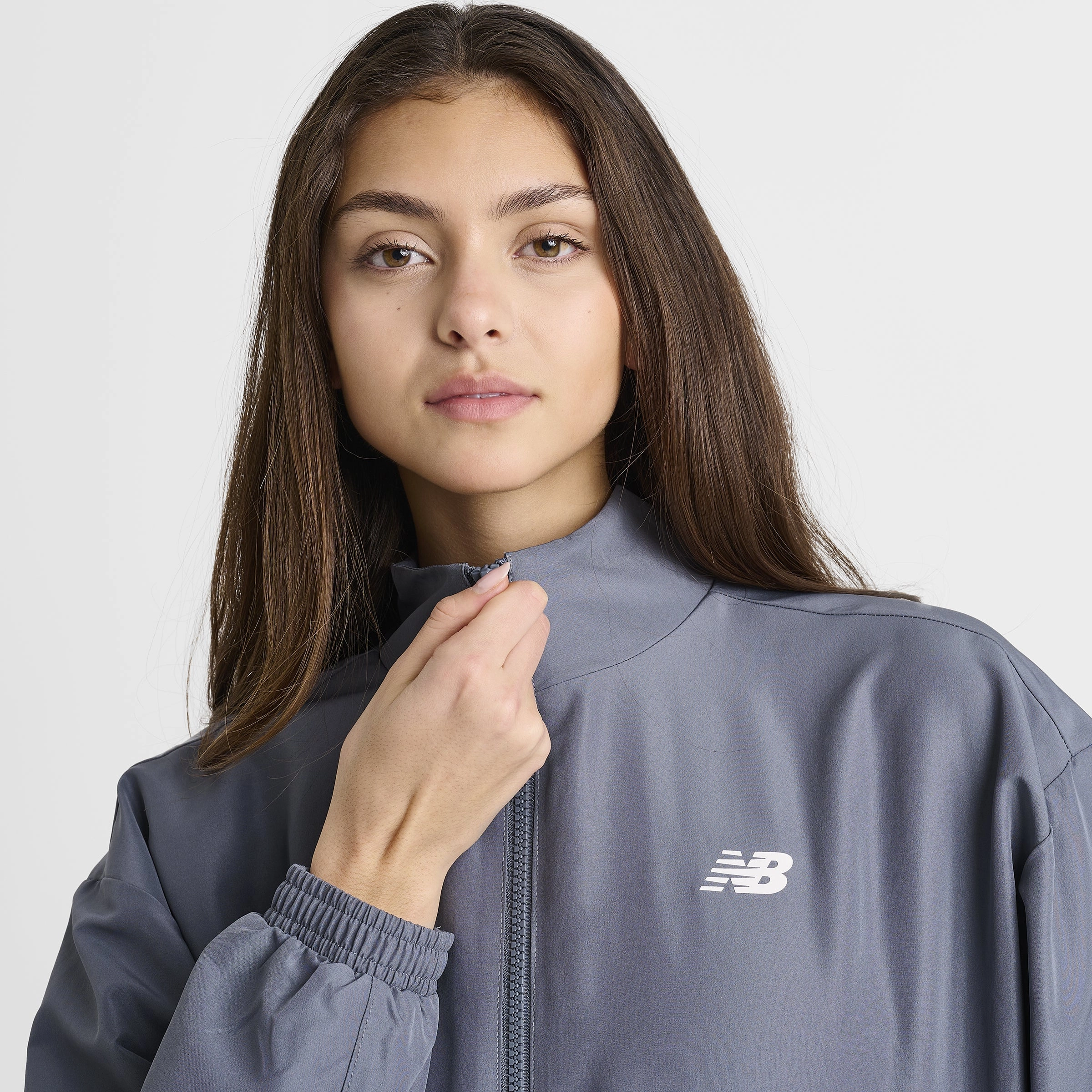 New Balance Women's Linear Woven Jacket / Dark Arctic Durable Stitching Convertible Cuff System