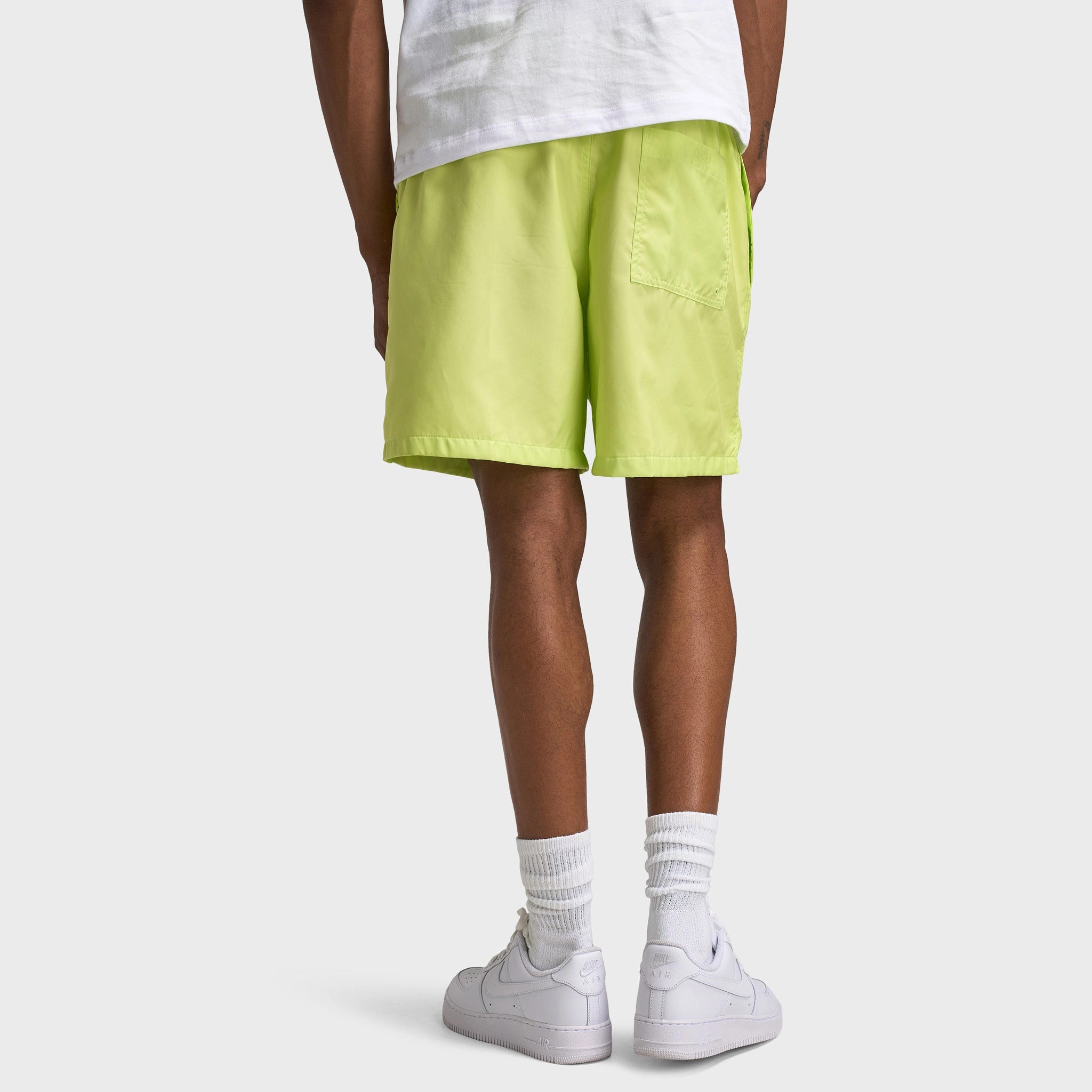 Nike Club Flow Shorts Light Lemon Twist / White Flexible Movement Cut