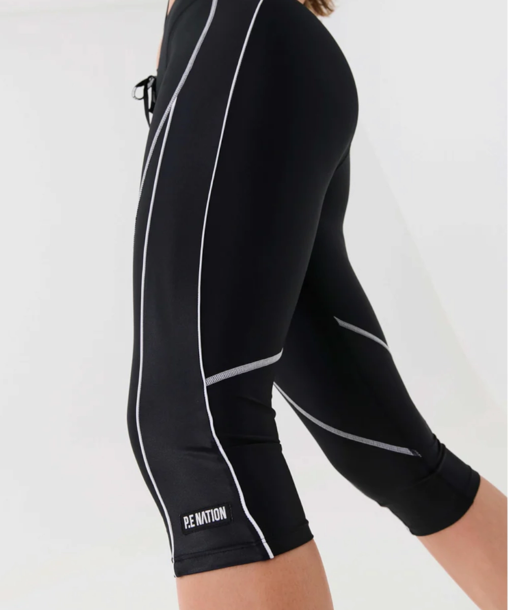 P.E Nation Reformer Crop Legging (Black) Gloss Glow Nordic Light