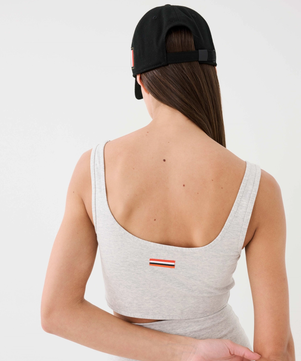 TearResistantMaterial Reinforced Knees P.E Nation The Leadoff Organic Cotton Sports Bra (Grey Marl)