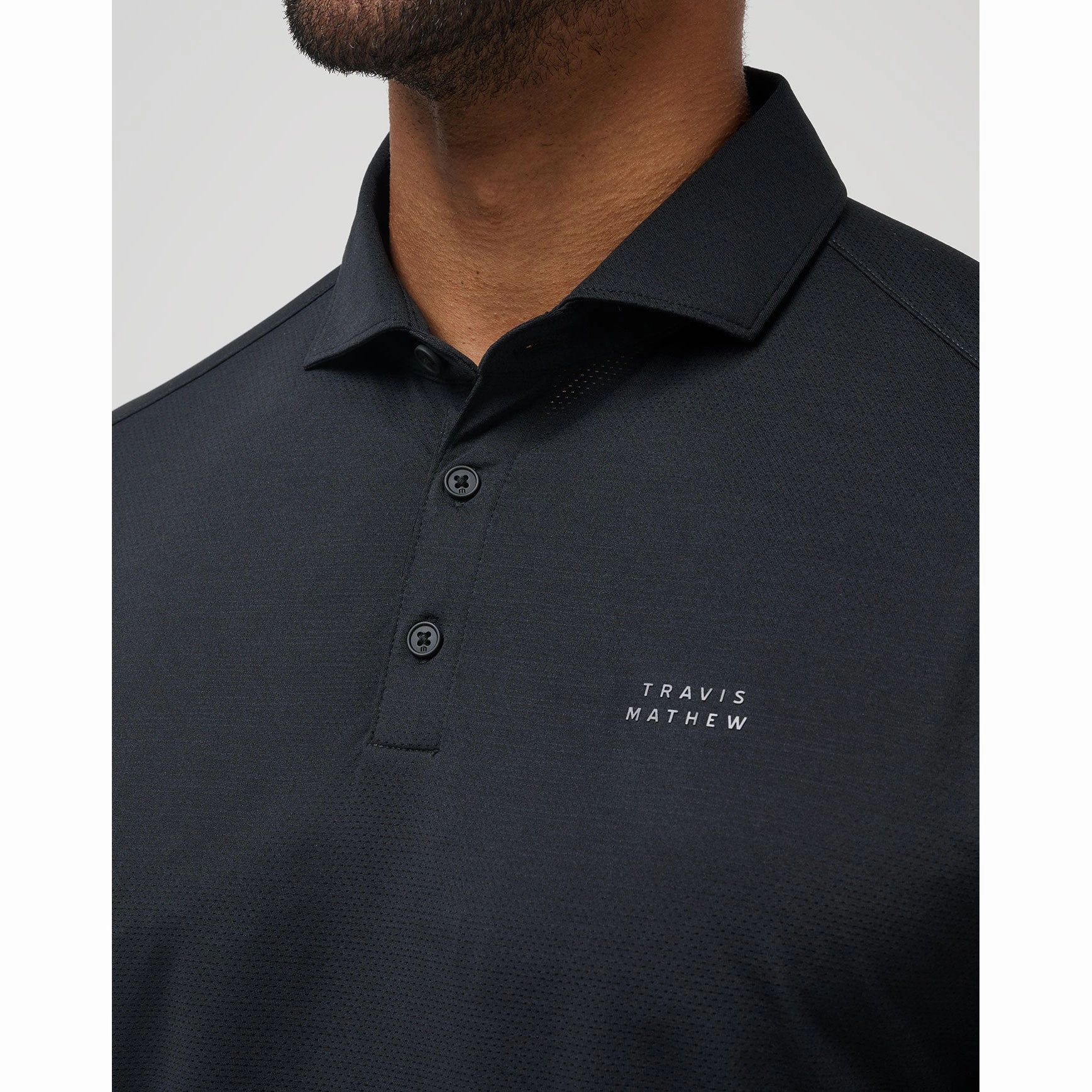 Travis Mathew Heater Pro Golf Shirt - Black Striped Design