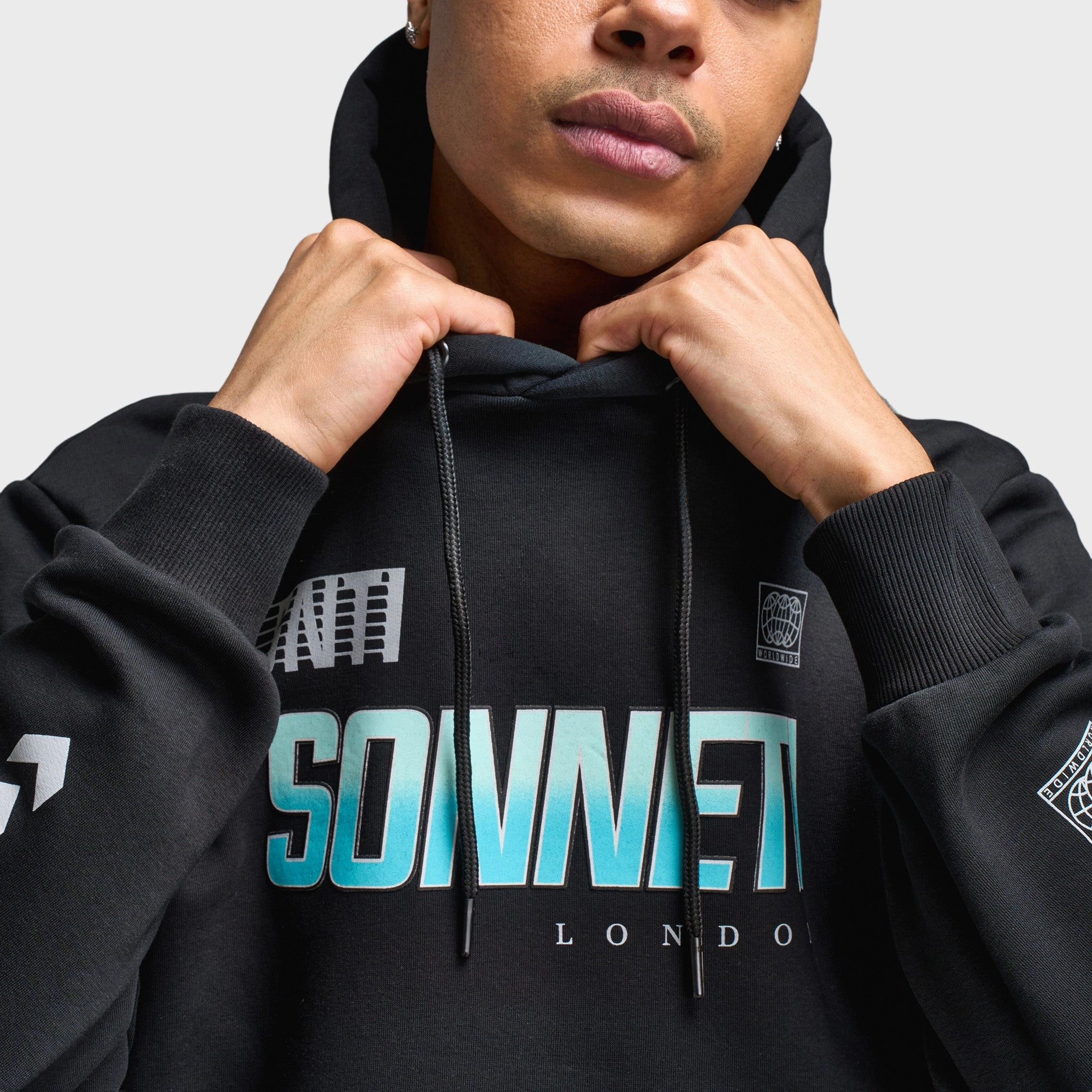 Sonneti Logan Pullover Hoodie / Black Non Restrictive Silhouette Flexible Joint Articulation