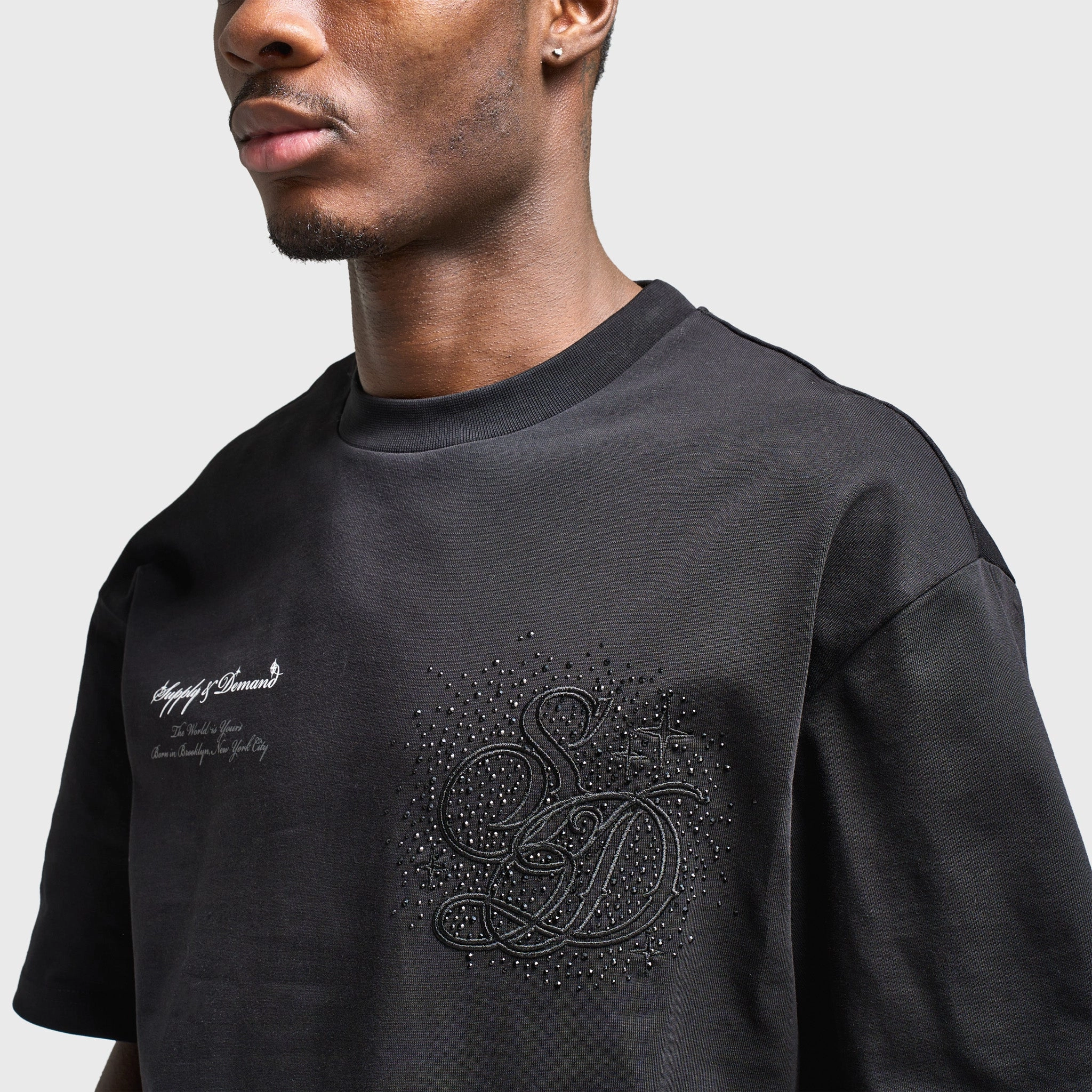 Motion Enhanced Supply & Demand Klink Graphic T-Shirt / Black