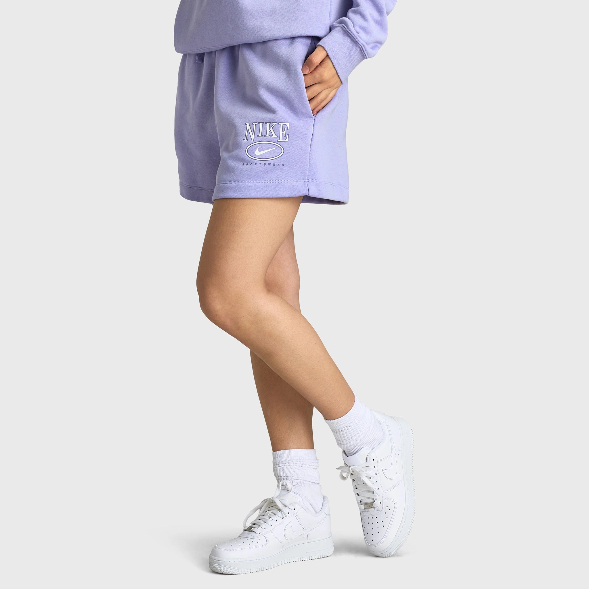 Minimal Finish Seamless Waistband Nike Sportswear Women's Club Fleece Mid Rise 4" Graphic Shorts / Lilac Ice